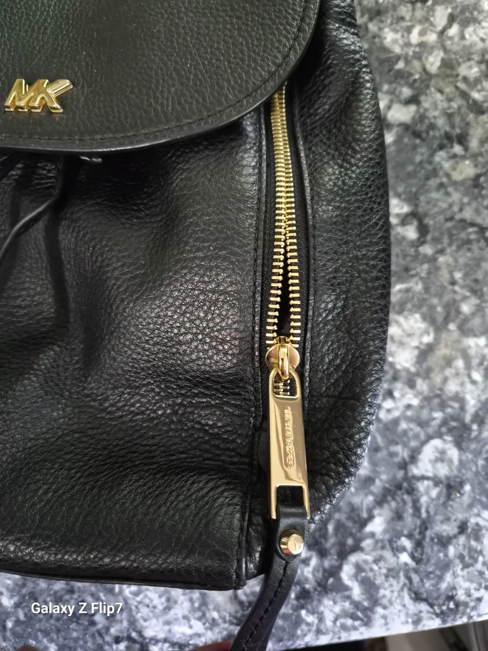 Michael Kors Black Pebbled Leather Backpack with Gold MK Logo